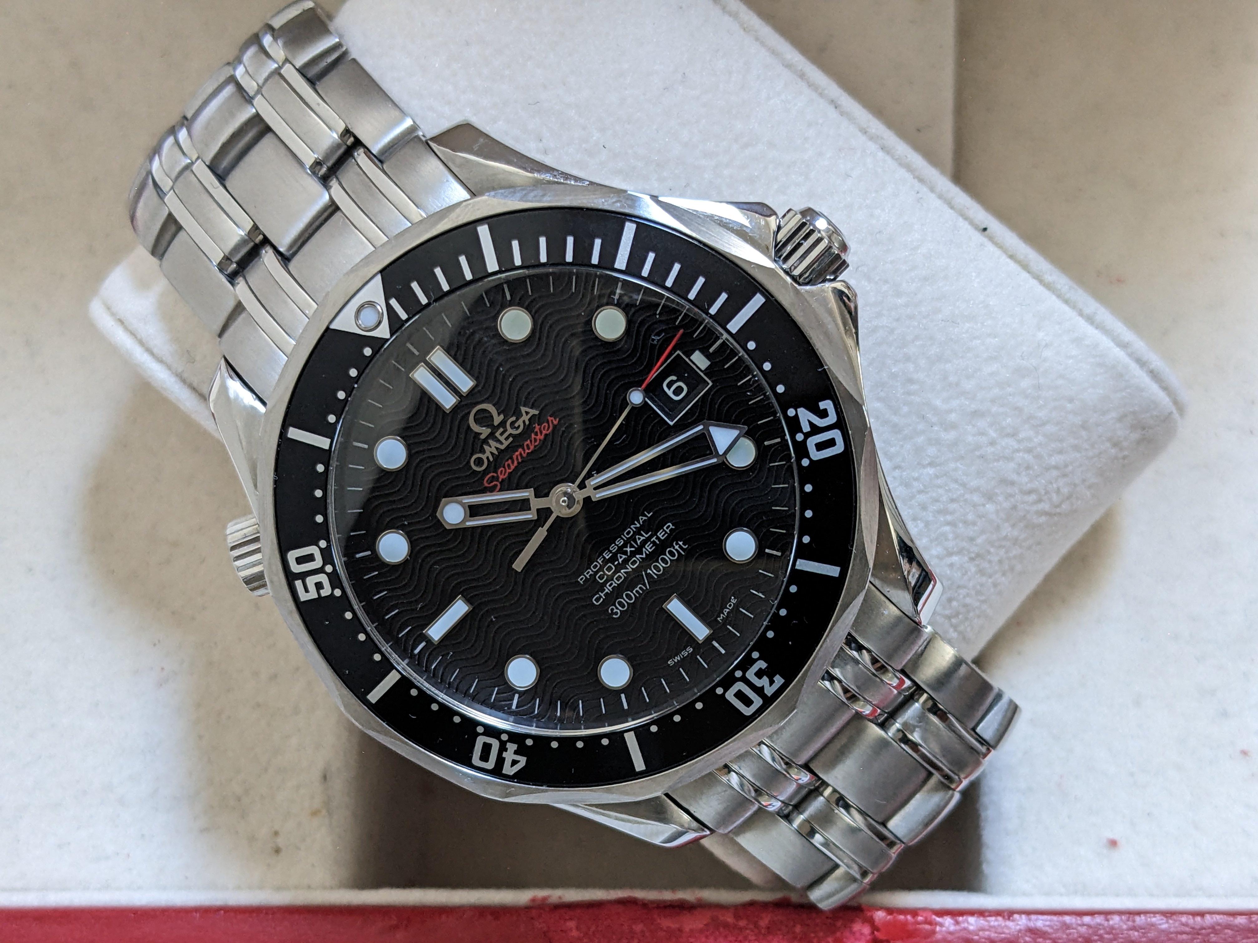 Omega seamaster hotsell black wave dial