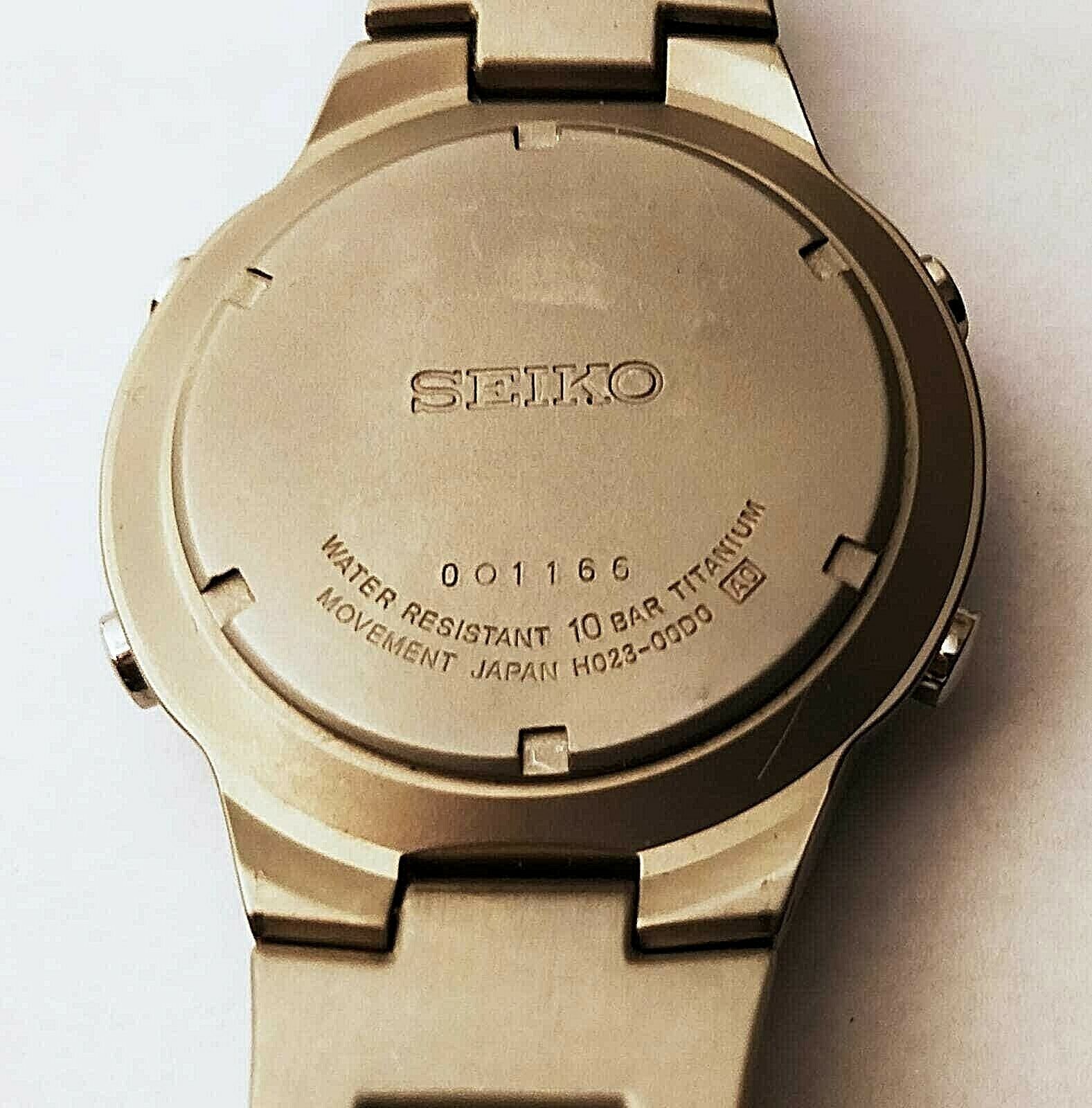 SEIKO H023-00D0 Analog & Digital TITANIUM Chrono Alarm World Time