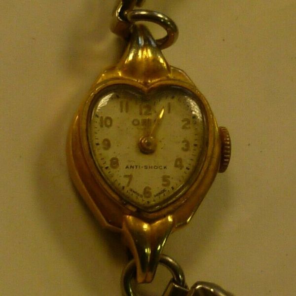 Vintage Oris ladies gold plated watch heart shaped face and glass
