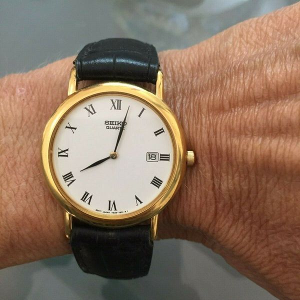 Vintage Authentic Seiko Quartz Gold Black Leather Watch | WatchCharts