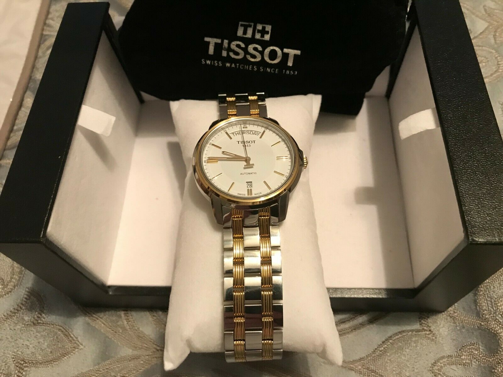 Tissot Men s automatic Swiss made watch T065930A WatchCharts