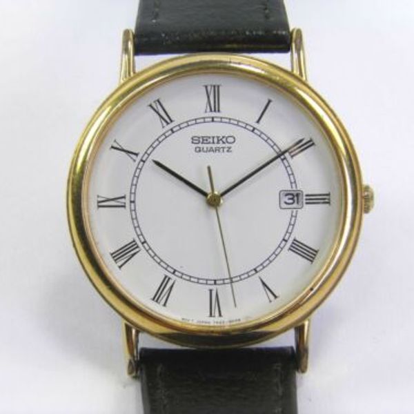 Vintage Mens Seiko Date 7N22-8A00 gold tone quartz dress wrist watch |  WatchCharts