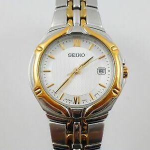 Seiko 7N82-OATO WR Two-Tone Stainless Analog Watch | WatchCharts