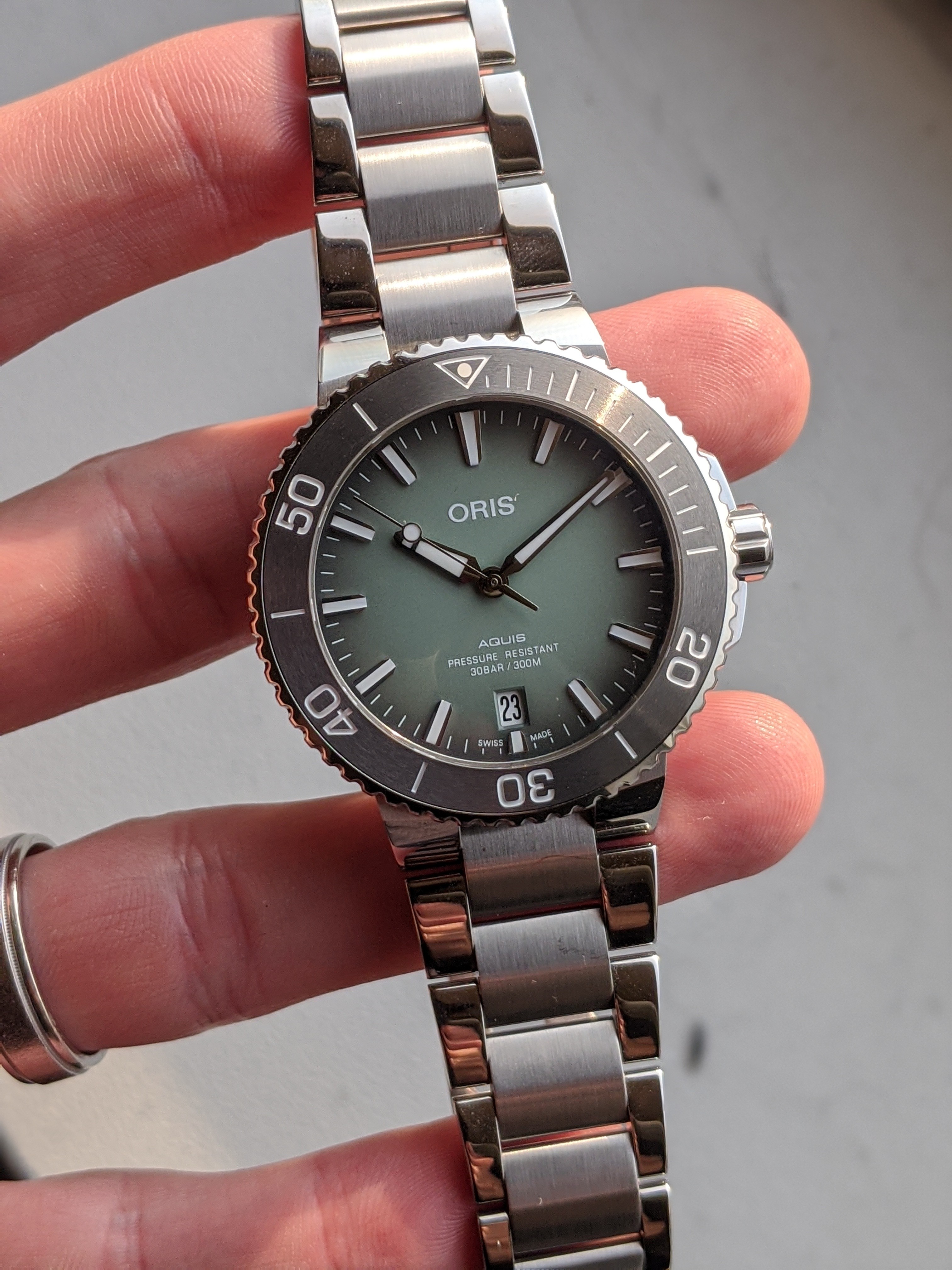 FS Oris Aquis Mint Green Dial Grey Tungsten Bezel on bracelet AD