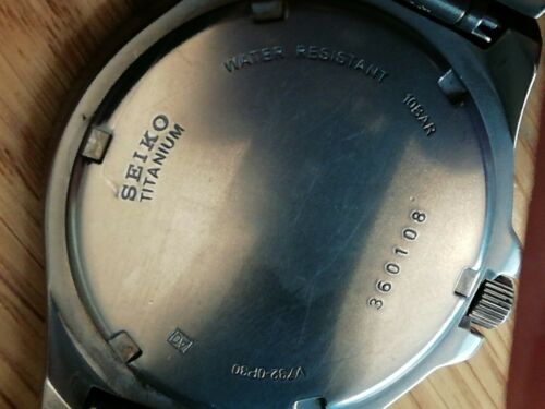 Seiko V732-0P30 Titanium Watch 100M Water Resist