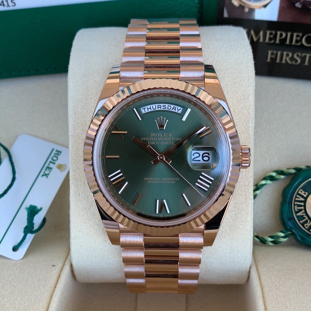 rolex day date anniversary price