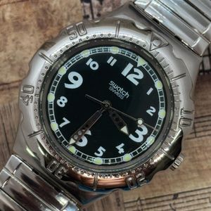 Swatch Irony Retrograde - YRS400G - Dark steel, unbenutzt