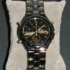 Seiko 7T32-6m69 Chronograph Watch Stainless Steel Black/Gold Mov't Japan |  WatchCharts