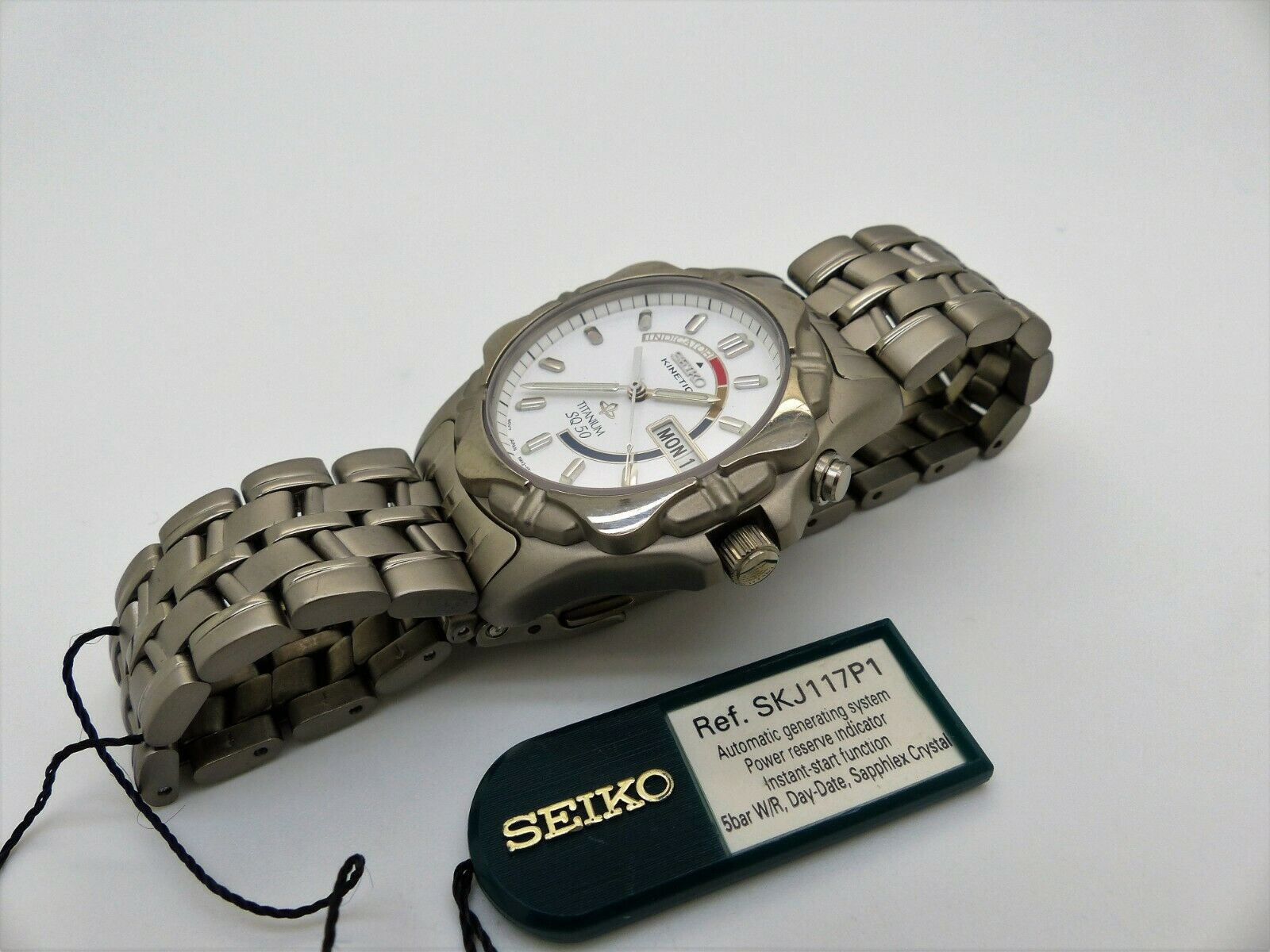 Seiko kinetic titan hot sale