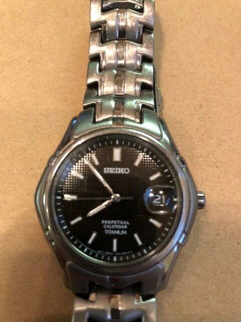 Seiko 8f32-0380 Perpetual Calendar Titanium Watch | WatchCharts