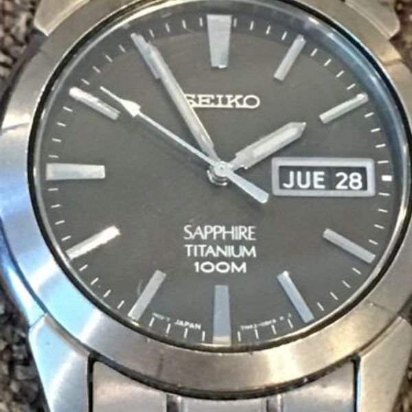Seiko Titanium 7N43-0AS0 Men's Day Date Watch Runs New Battery
