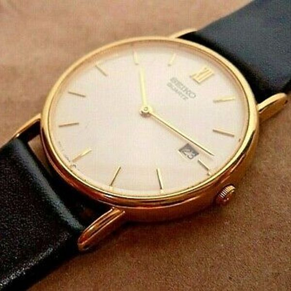 Seiko 5Y39-7010 Classic Mid-Sized Mens Gold Plated Quartz Date Watch~New XL  Band | WatchCharts