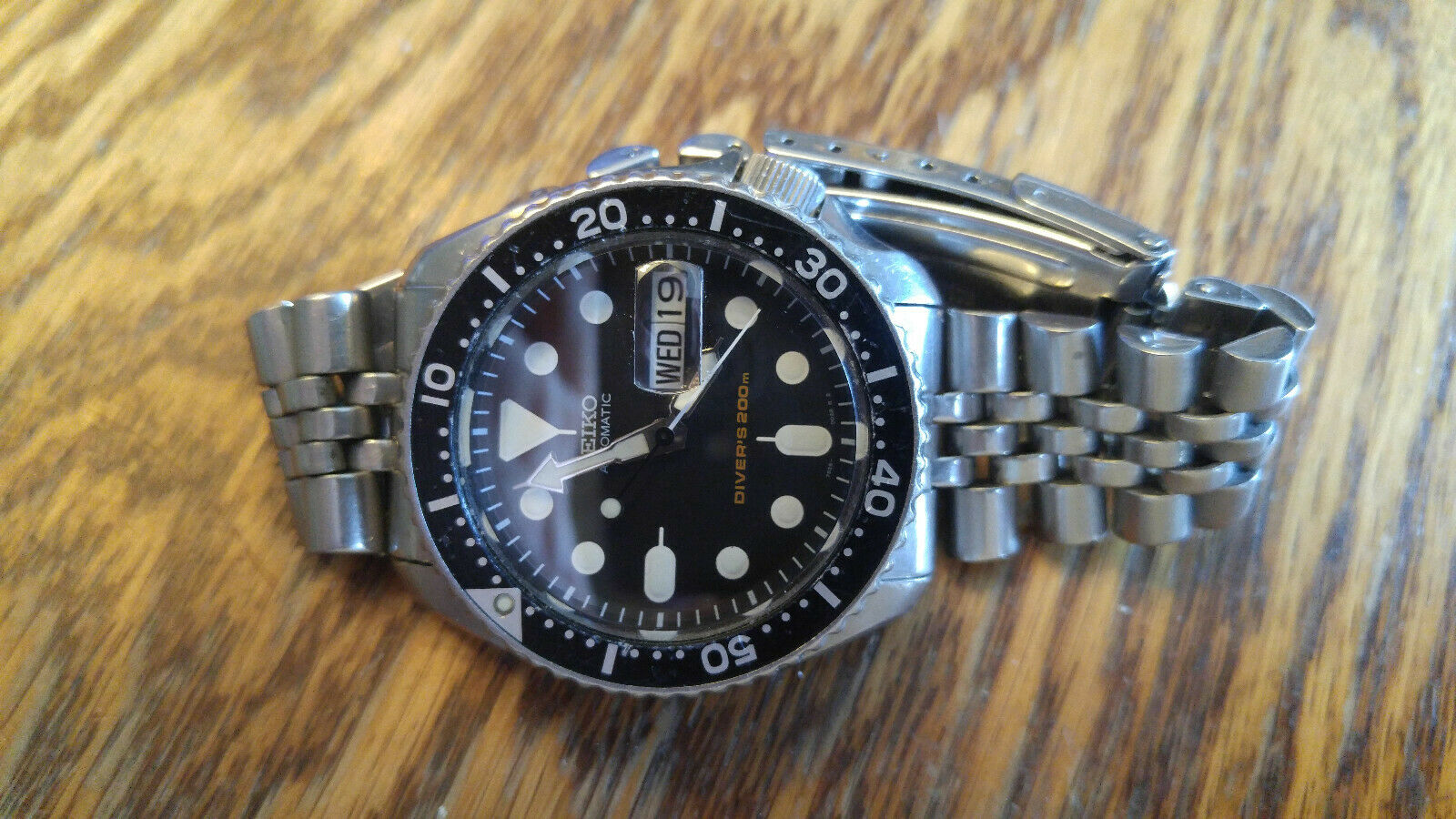 Seiko SKX007 with Sapphire Crystal with Day/date cyclops | WatchCharts