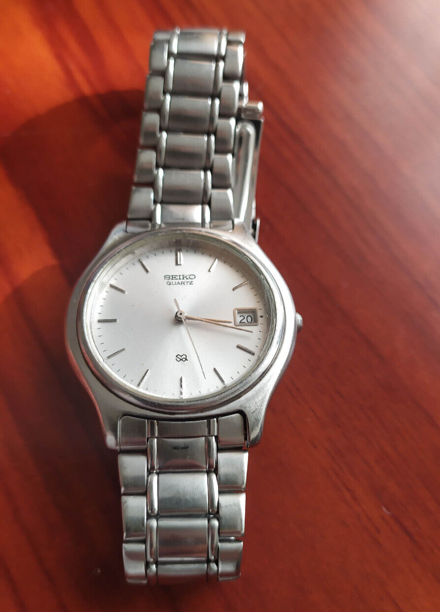 Seiko White Dial Date 7N42-7011 A4 Working Fine Watch 