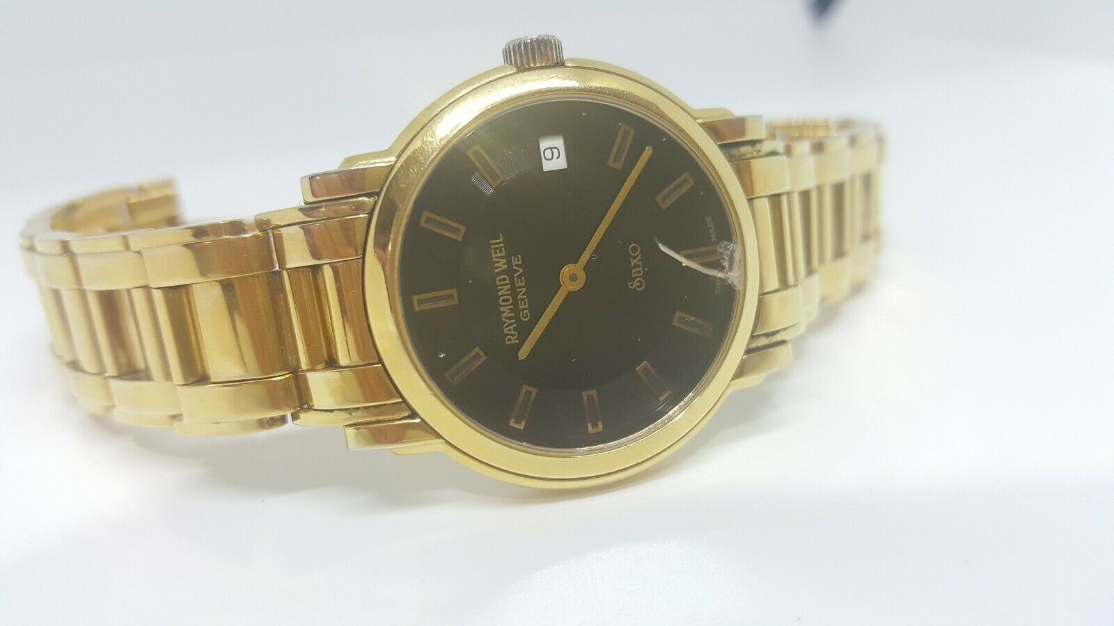 Raymond Weil Saxo 9520 Gold Electroplated Black Dial Quartz