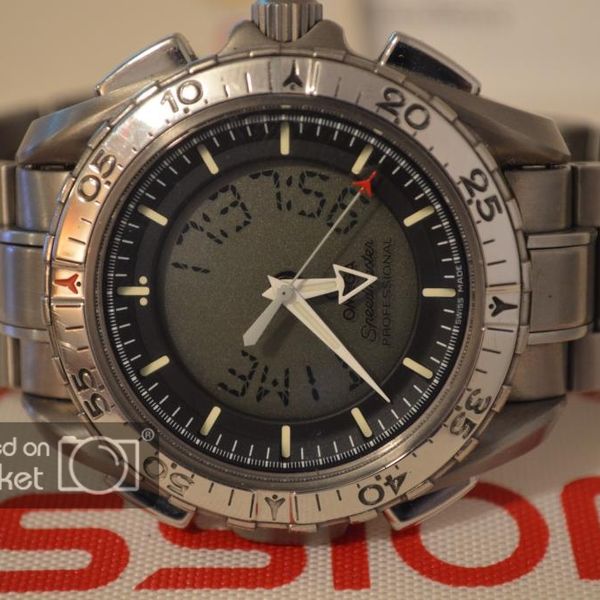 OMEGA X33 EXCELLENT CONDITION! WITH BOX AND CARD CARBON FIBER BAND AND