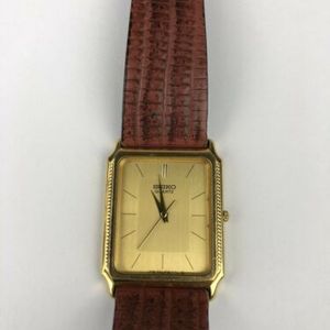 Seiko 9521 - 5040 Swiss Quartz Stainless Steel Case Gold Tone