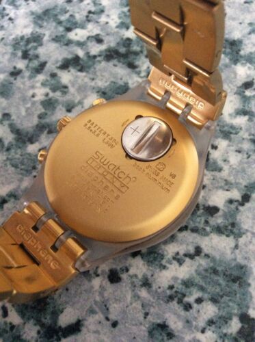 Swatch irony diaphane patented water resistant golden wristwatch