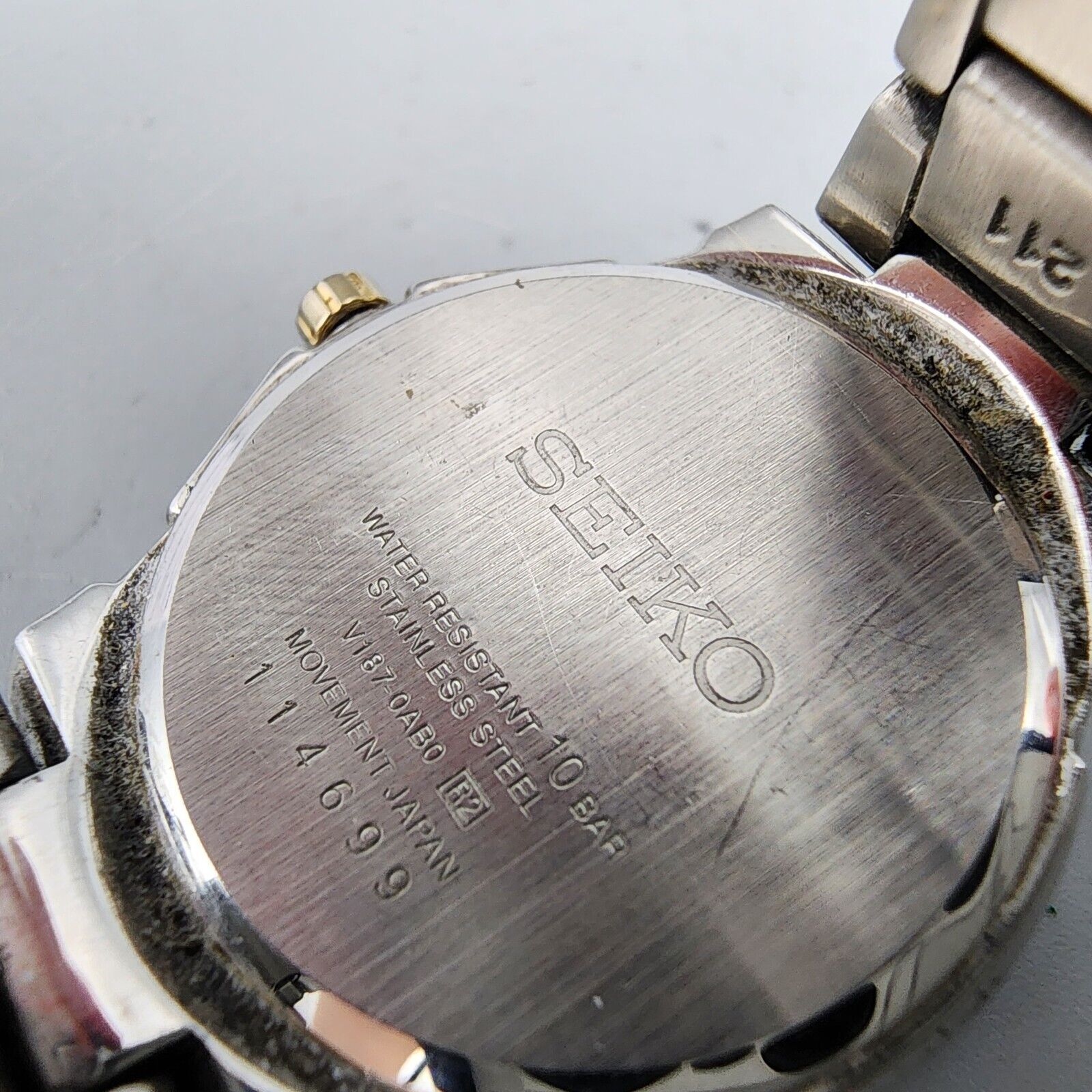 Seiko Solar Watch Women Two Tone White Dial Date 100M Round V187 