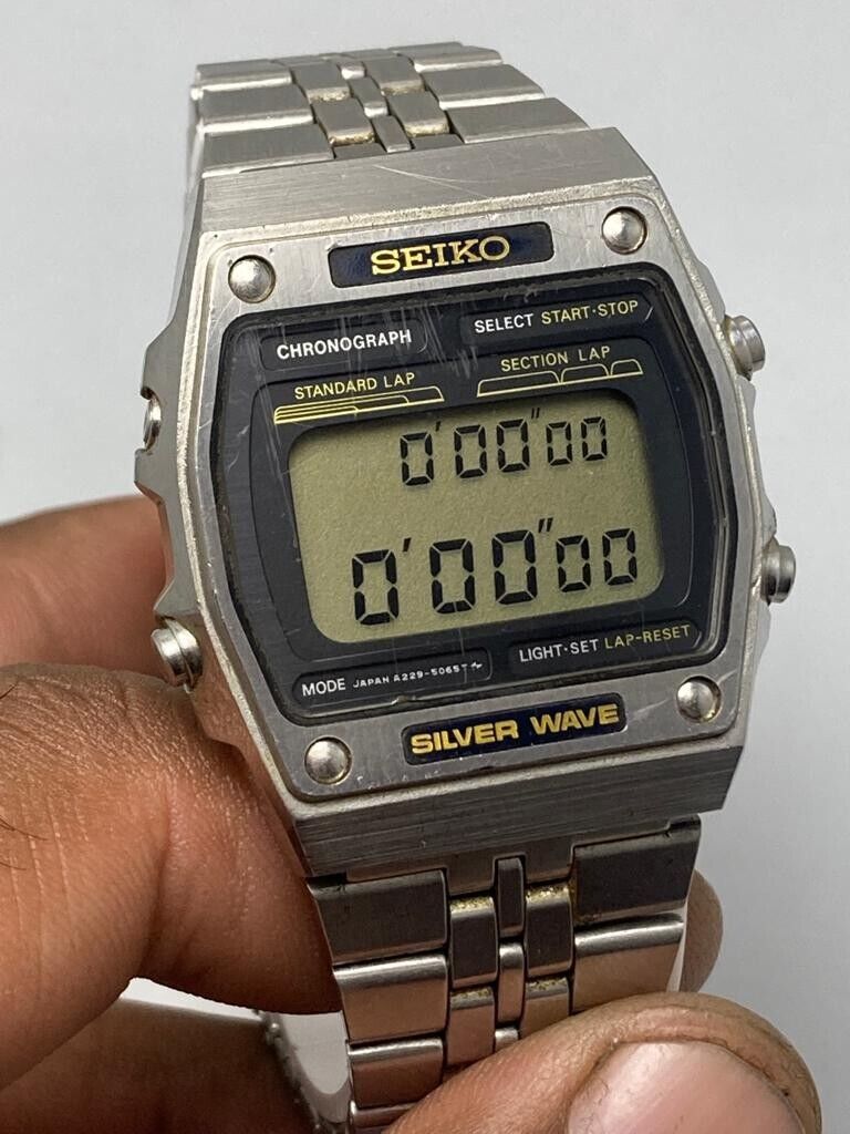 Vintage Seiko A229-5050 Silver Wave LCD Digital Men's Wristwatch