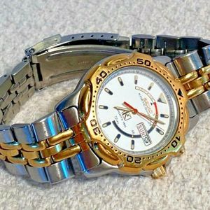 Vintage 40mm Seiko 5M23-6A09 Kinetic Quartz Sports 150 day/date mens watch  | WatchCharts