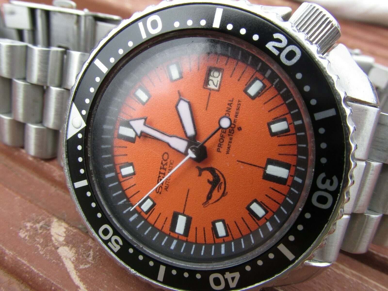 Superb Vintage SEIKO 150m Divers 7002 Automatic MOD Orange dolphin Scuba  dial | WatchCharts