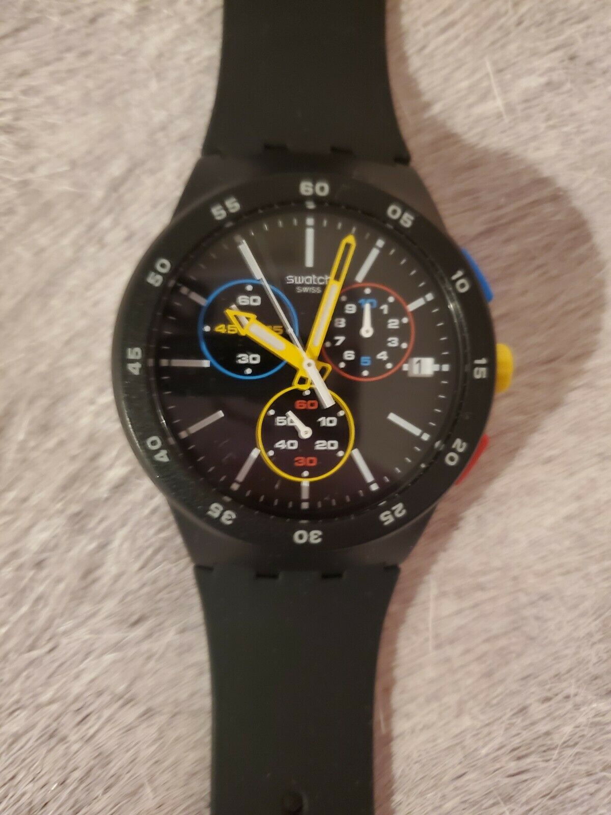 Swatch the black cheap one