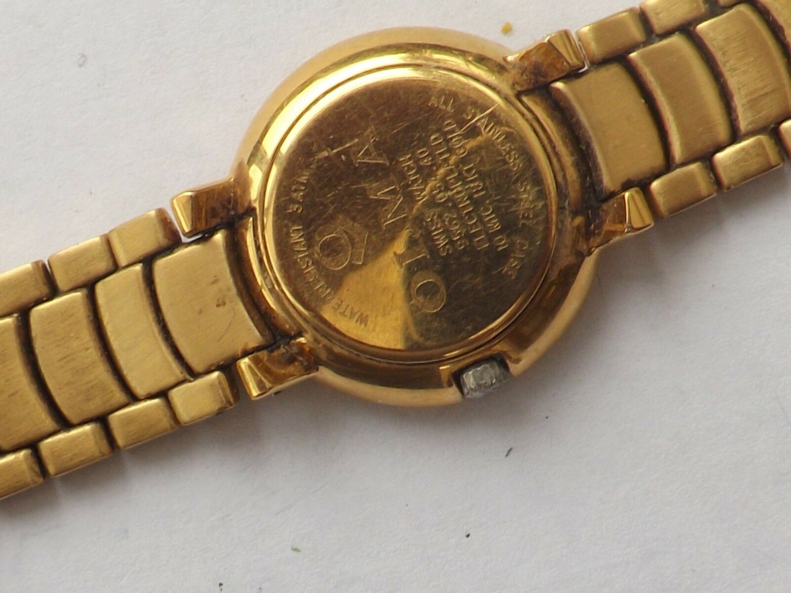 Olma hotsell gold watch