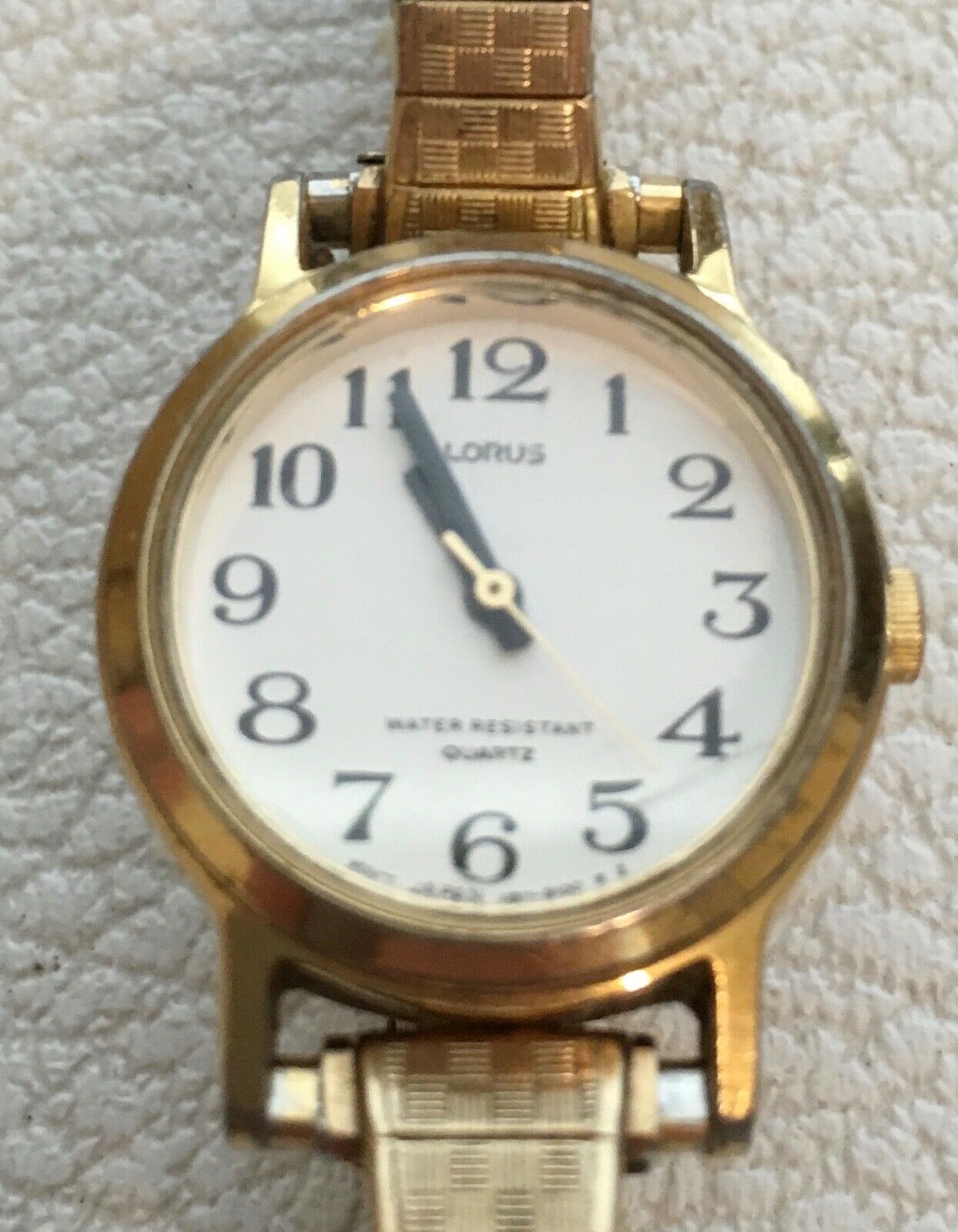 Lorus Women's watch. store White face. V811-0810 AO