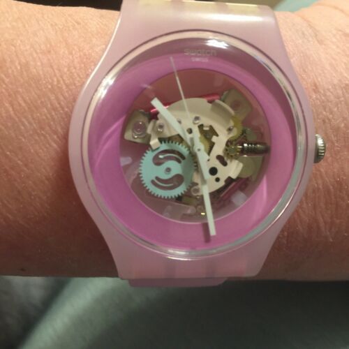 Watch with visible outlet inner workings