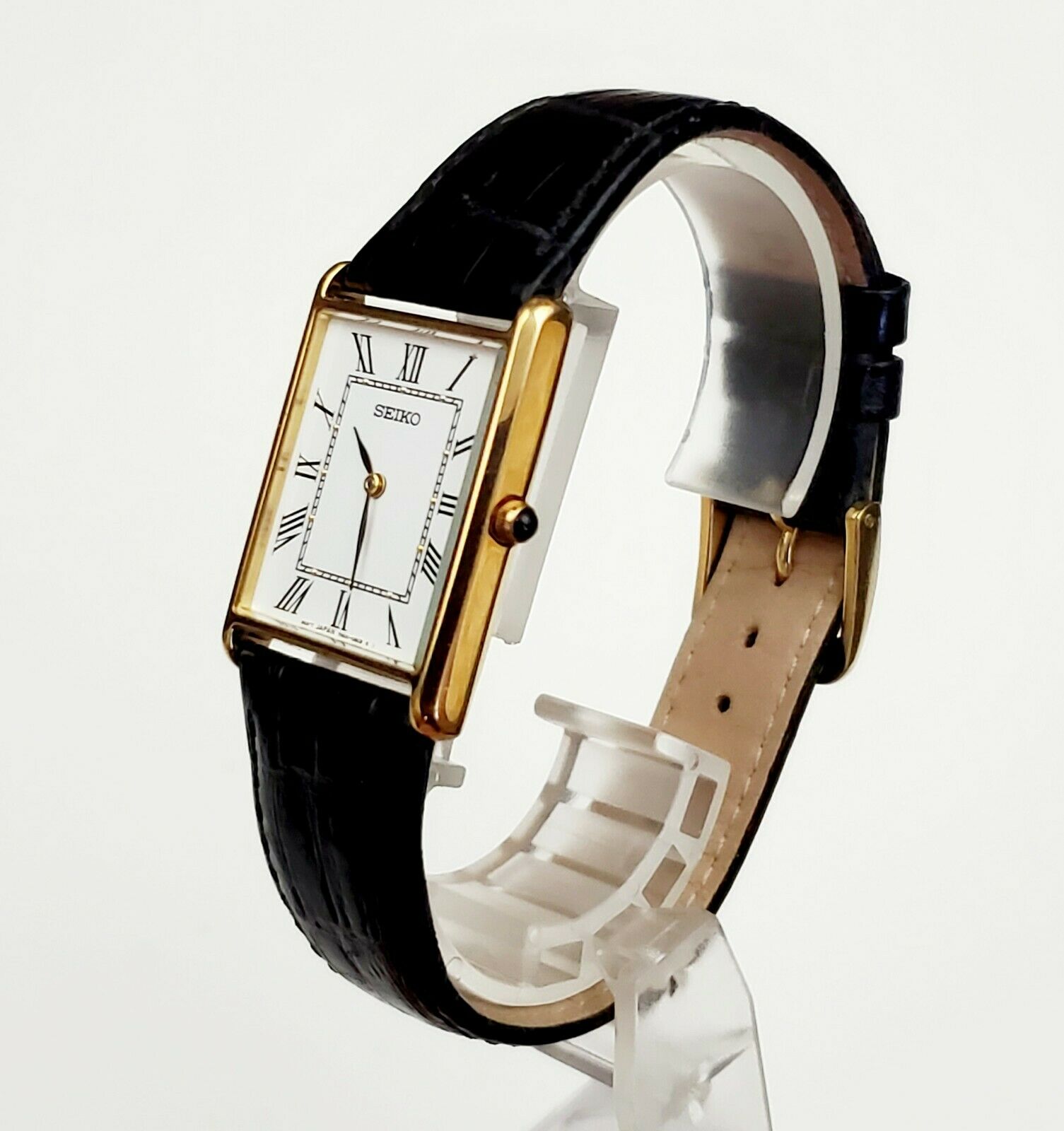 Mens Gold Tone Seiko 7N00-5C70 White Roman Tank Statement