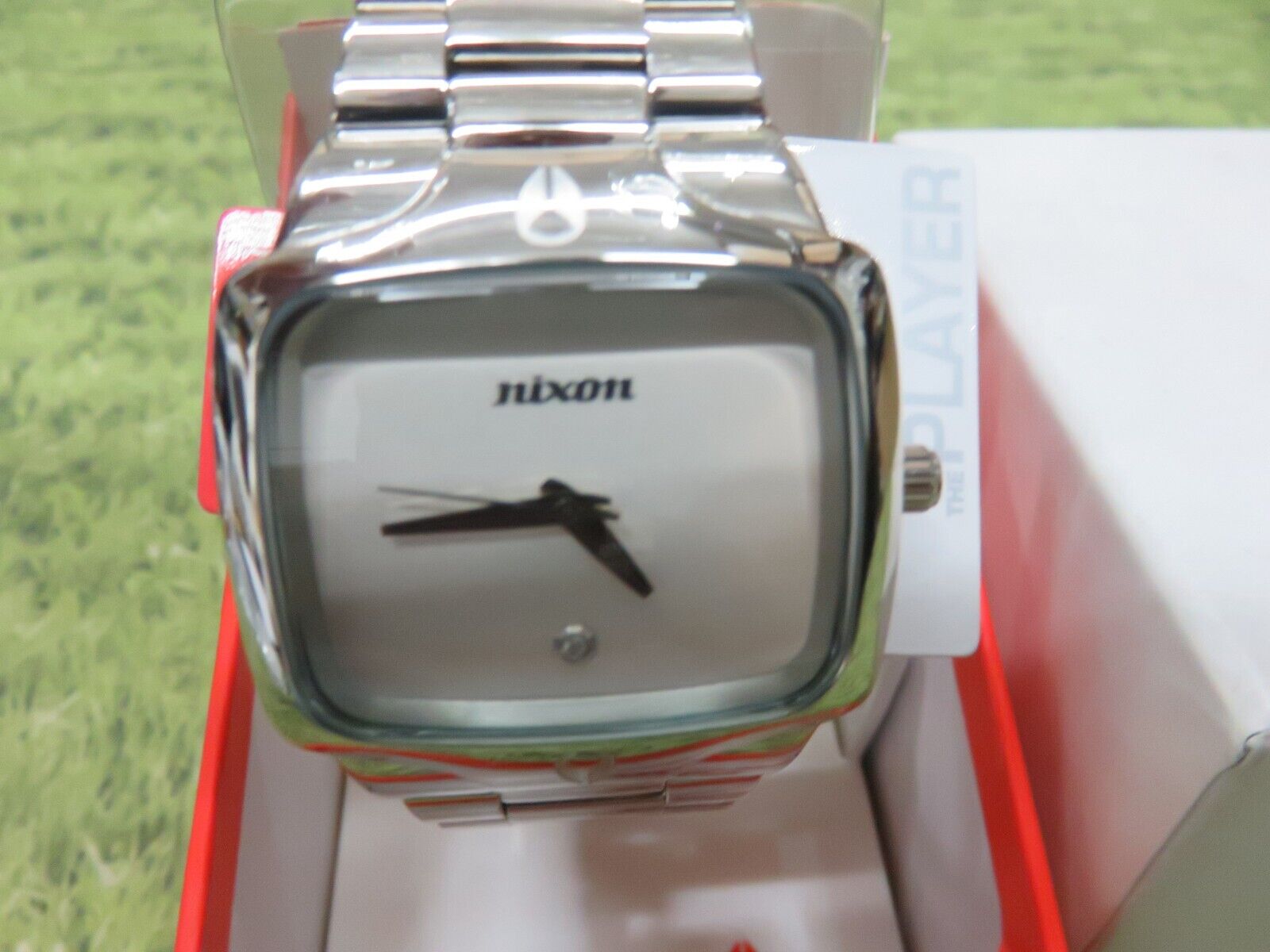 Nixon player clearance watch diamond real