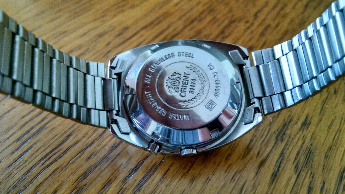 ORIENT AAA, AUTOMATIC, FACETED CRYSTAL, 21 JEWELS, DAY DATE