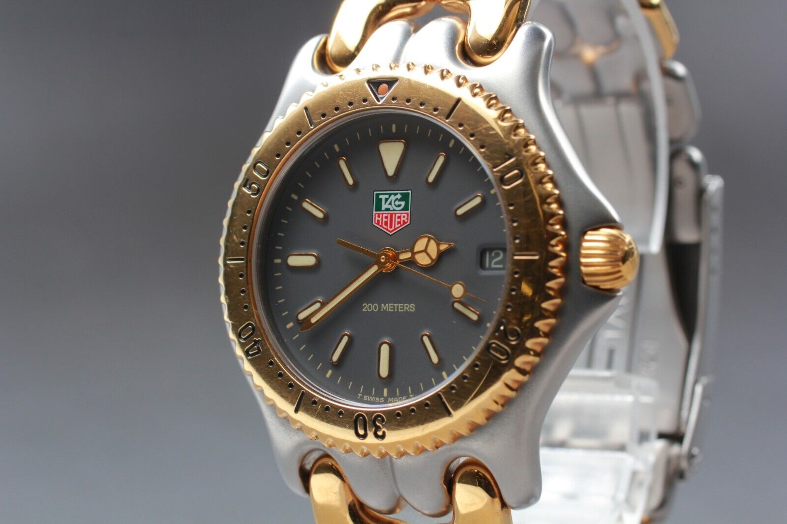 EXC 5 TAG HEUER S95.206M Gold x Silver 200m Men s Qz Black Dial