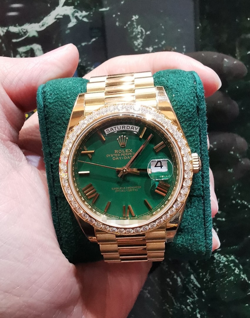 Sept 2023 Rolex Day Date 40 yellow gold green dial factory diamond