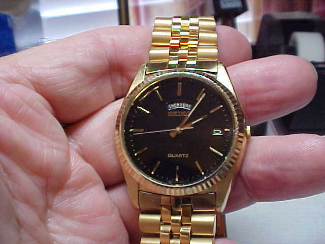 NICE USED MANS SEIKO ALL GOLD PLATE PRESIDENT MODEL BLACK DIAL DAY/DATE  MODEL 7N | WatchCharts