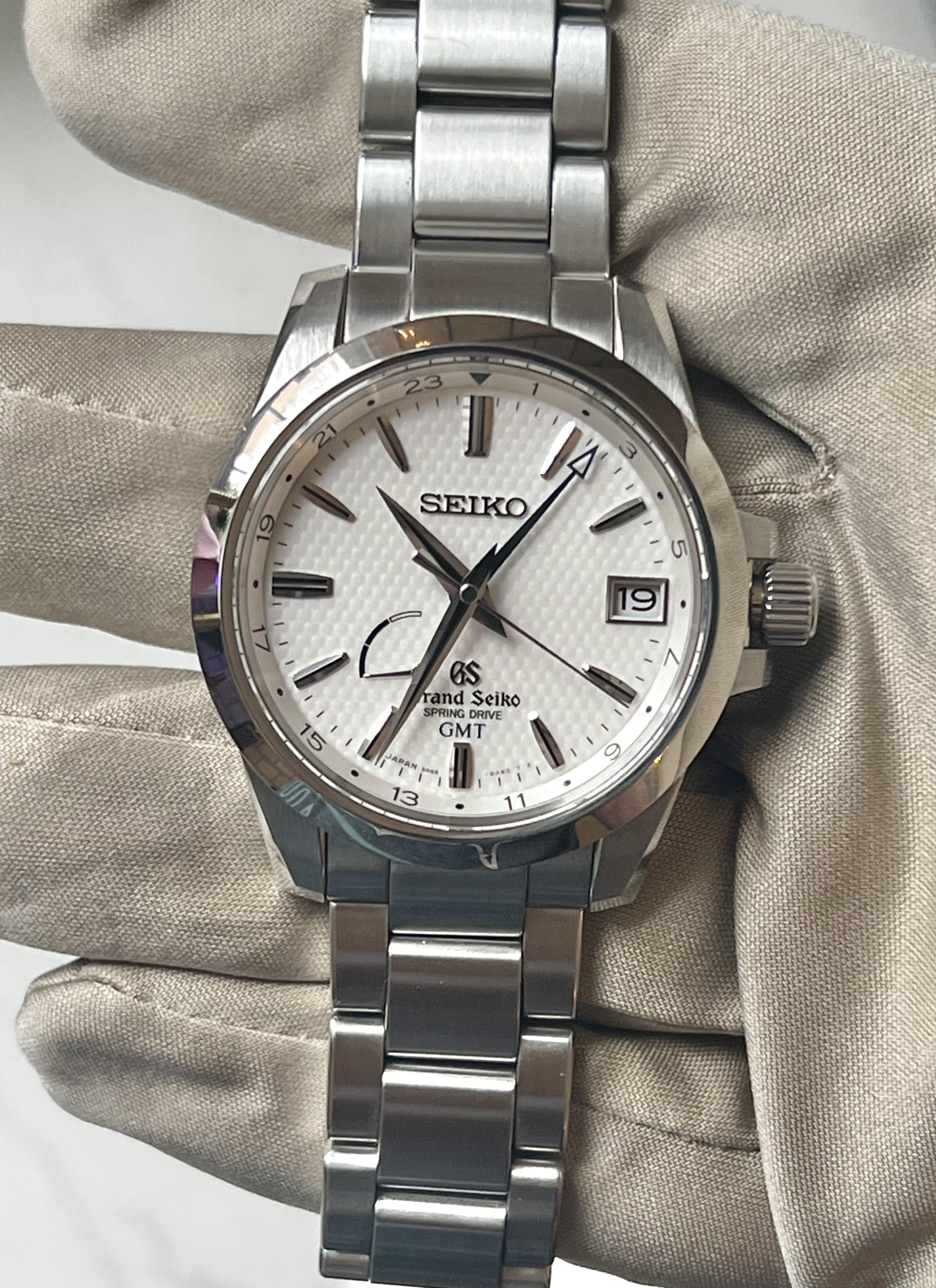 WTS] Grand Seiko SBGE009/9R66-0AE0 Date GMT Spring Drive White Honeycomb  Dial B&P $2599 | WatchCharts