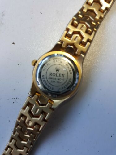 rolex swiss movt 23k 30m oyster perpetual