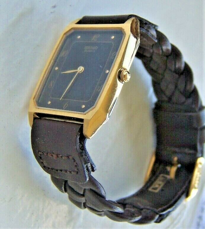 VTG SEIKO QUARTZ JAPAN BLACK GOLD TONE 5P30-5D30 684248 NEW