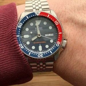 Seiko SKX009 Automatic Pepsi Bezel Diver Watch 7S26-0020 Jubilee Bracelet |  WatchCharts