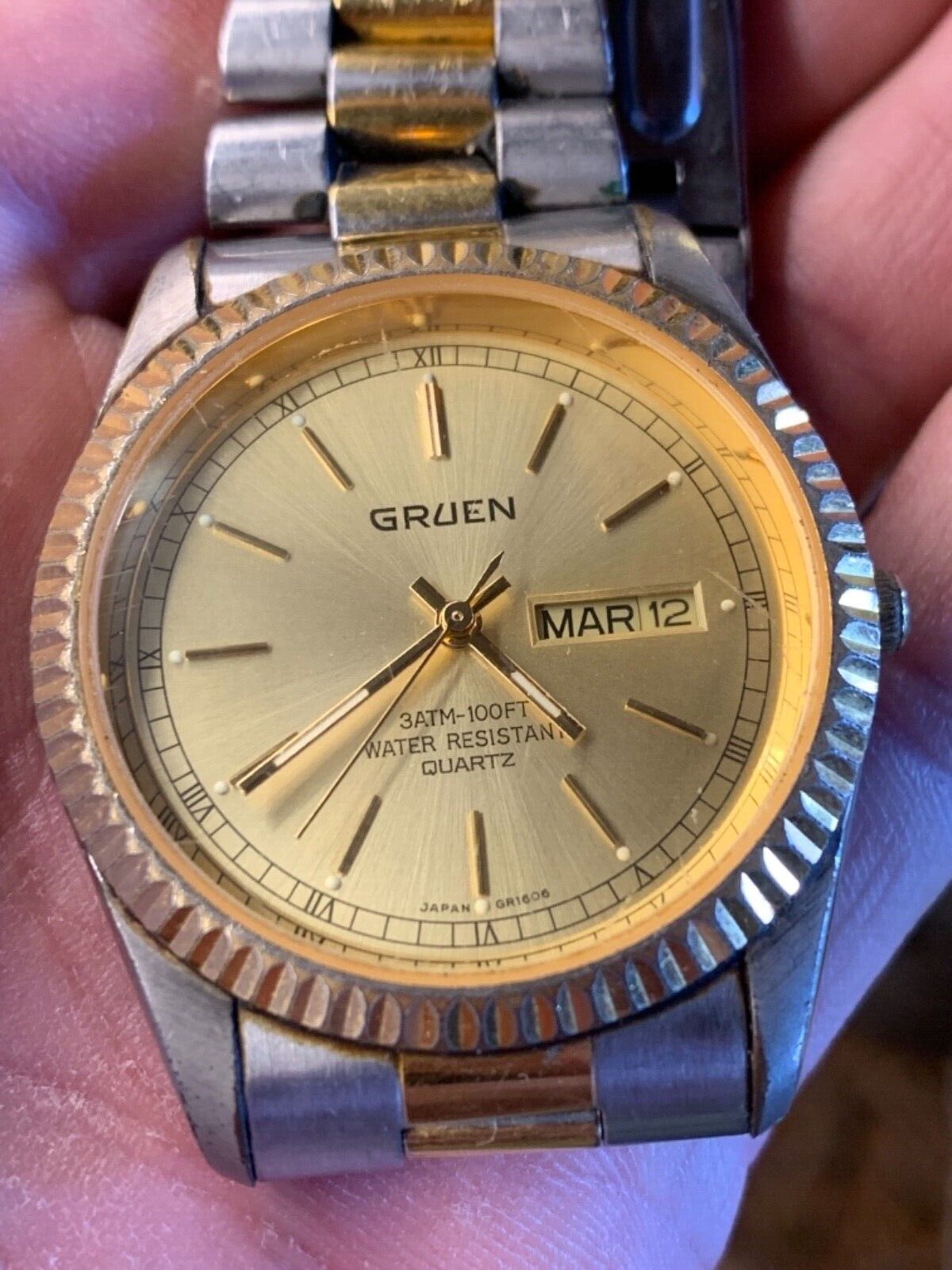 Gruen men's watch. 2024 Black face. Gold band. 219-2105