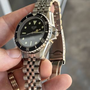 TAG Heuer 1000 Series 980.013 Price as of September 2026 | WatchCharts