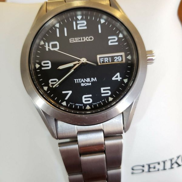 Seiko Titanium Quartz Movement SGG711 37mm discontinued model, arabic  numerals | WatchCharts