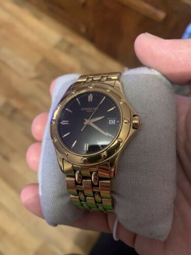 Raymond weil hot sale tango gold