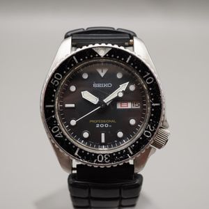 SEI KO 7820-5160 VINTAGE Quartz Black Silver Stainless 29m