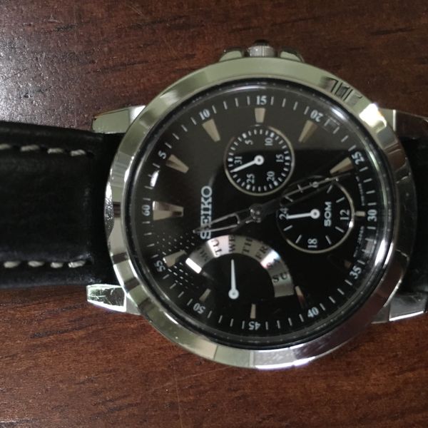 Montre Seiko Homme SNT006 - Cadran Rétrograde, Indicateur Jour, Bracelet Cuir - Neuve Avec étiquettes