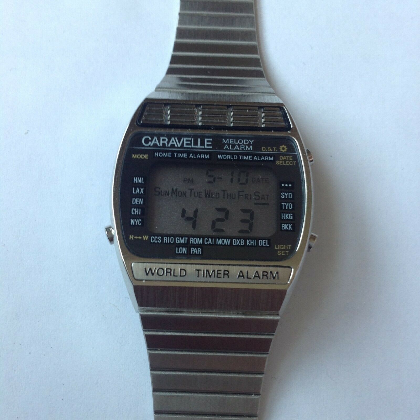 Bulova Caravelle world time melody alarm digital watch 33mm compare Seiko A239 WatchCharts Marketplace