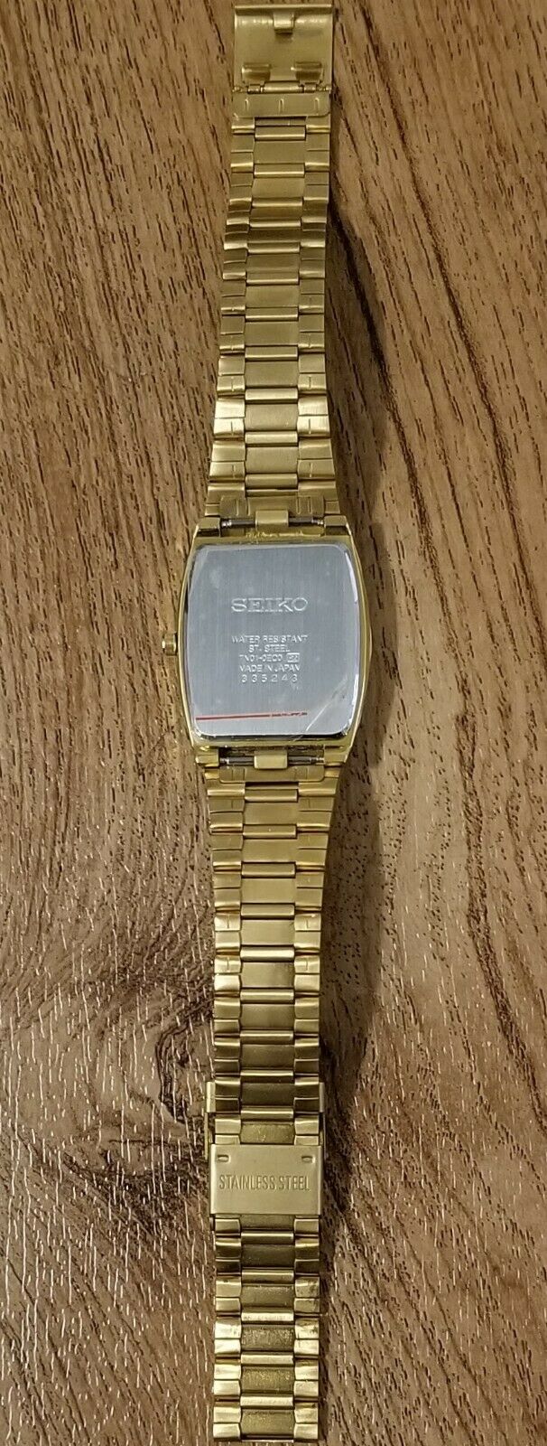 Seiko 7N01 0EC0 R2 Rectangular Face Gold Tone Watch Day Date