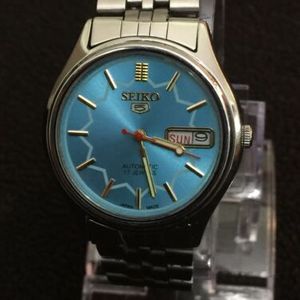 seiko 5 automatic japan,day/date Beautiful Light Blue Face Gold Dail 17  Jewels | WatchCharts