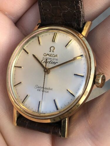 cartier or omega